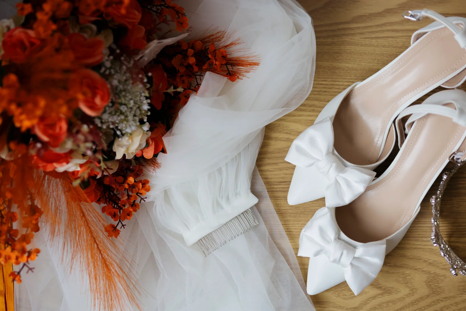 Bridal shoes orange bouquet