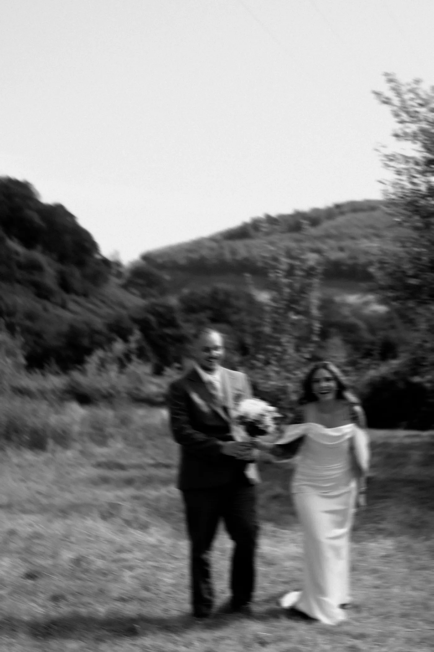 Creative blurred black-and-white portrait of newlyweds at Nant y Walch Barn