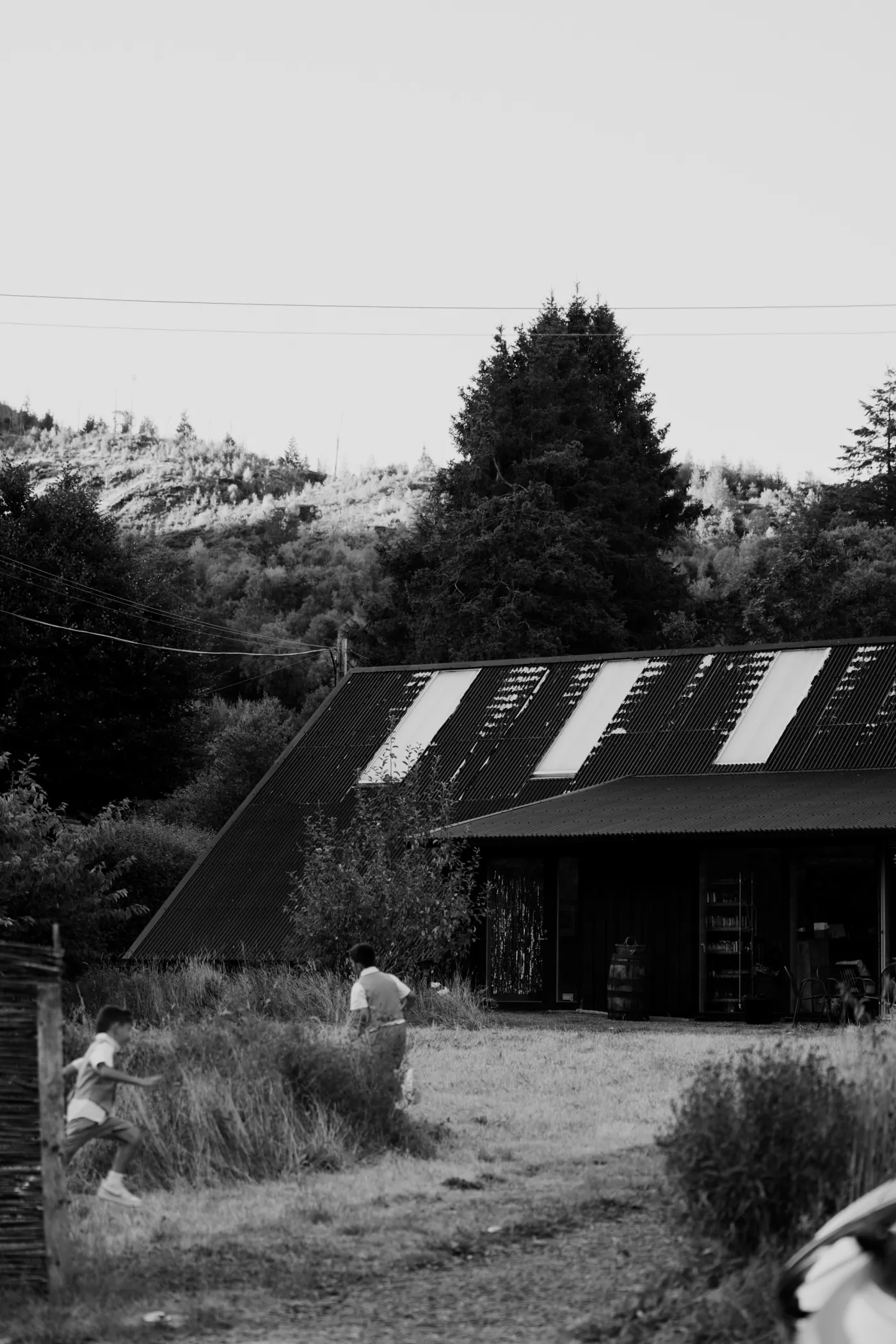 A quiet black-and-white wedding moment at Nant y Walch Barn